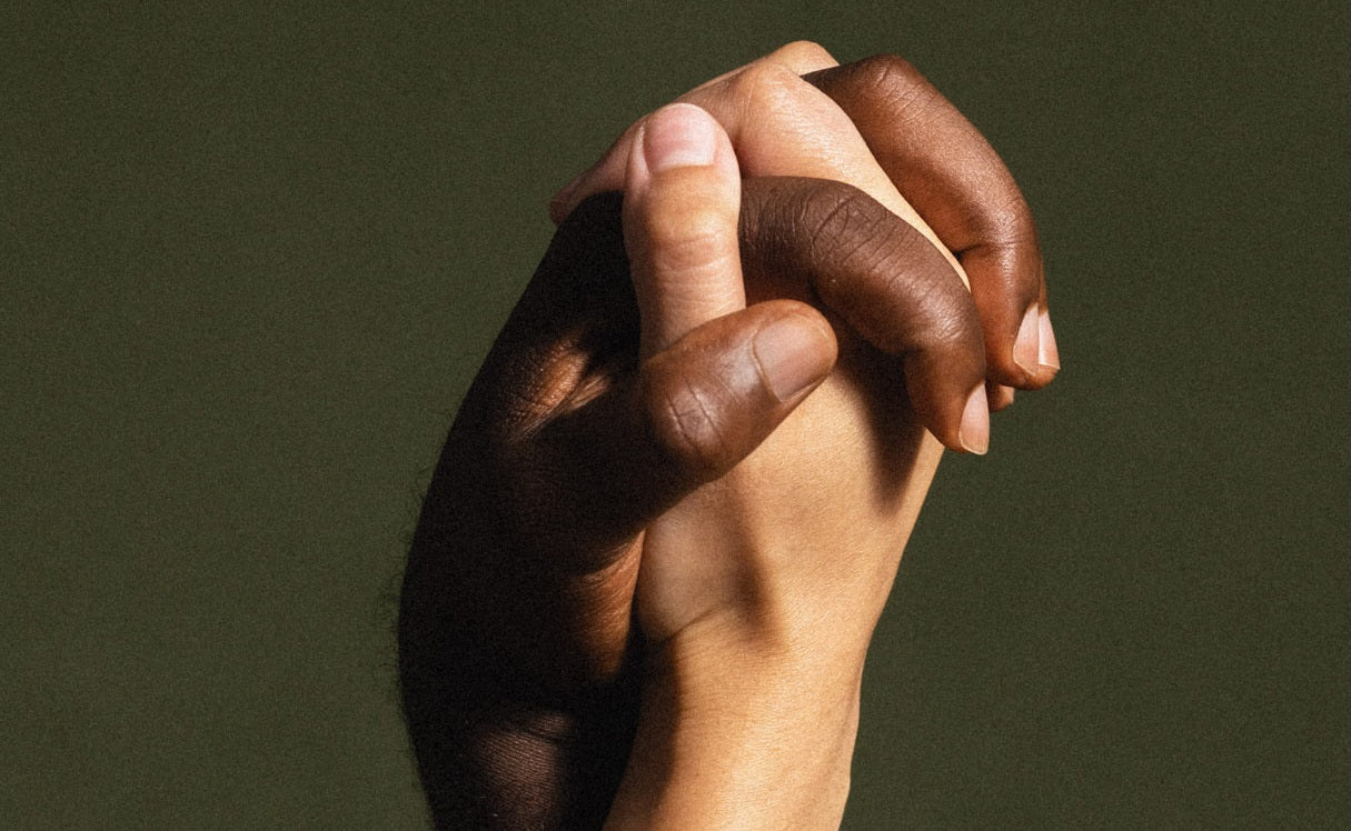 Hands touching showing skin texture