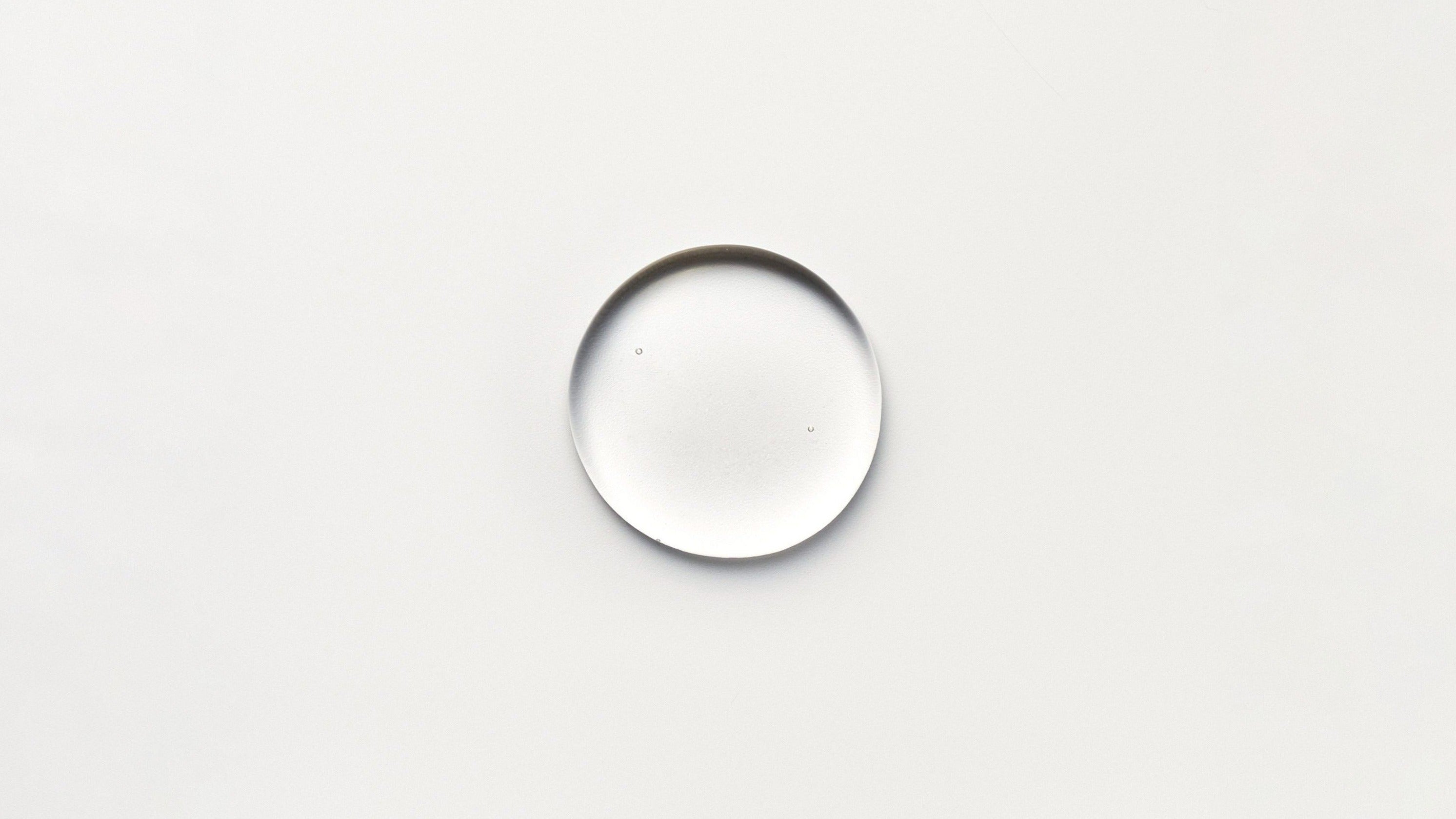 a photo of the hydrolytic serum droplet on a white background