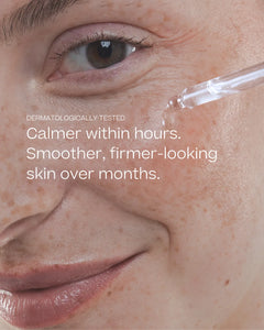 Close-up of the Hydrolytic® Serum being applied, with text: Dermatologically tested. Calmer within hours. Smoother, firmer-looking skin over months.